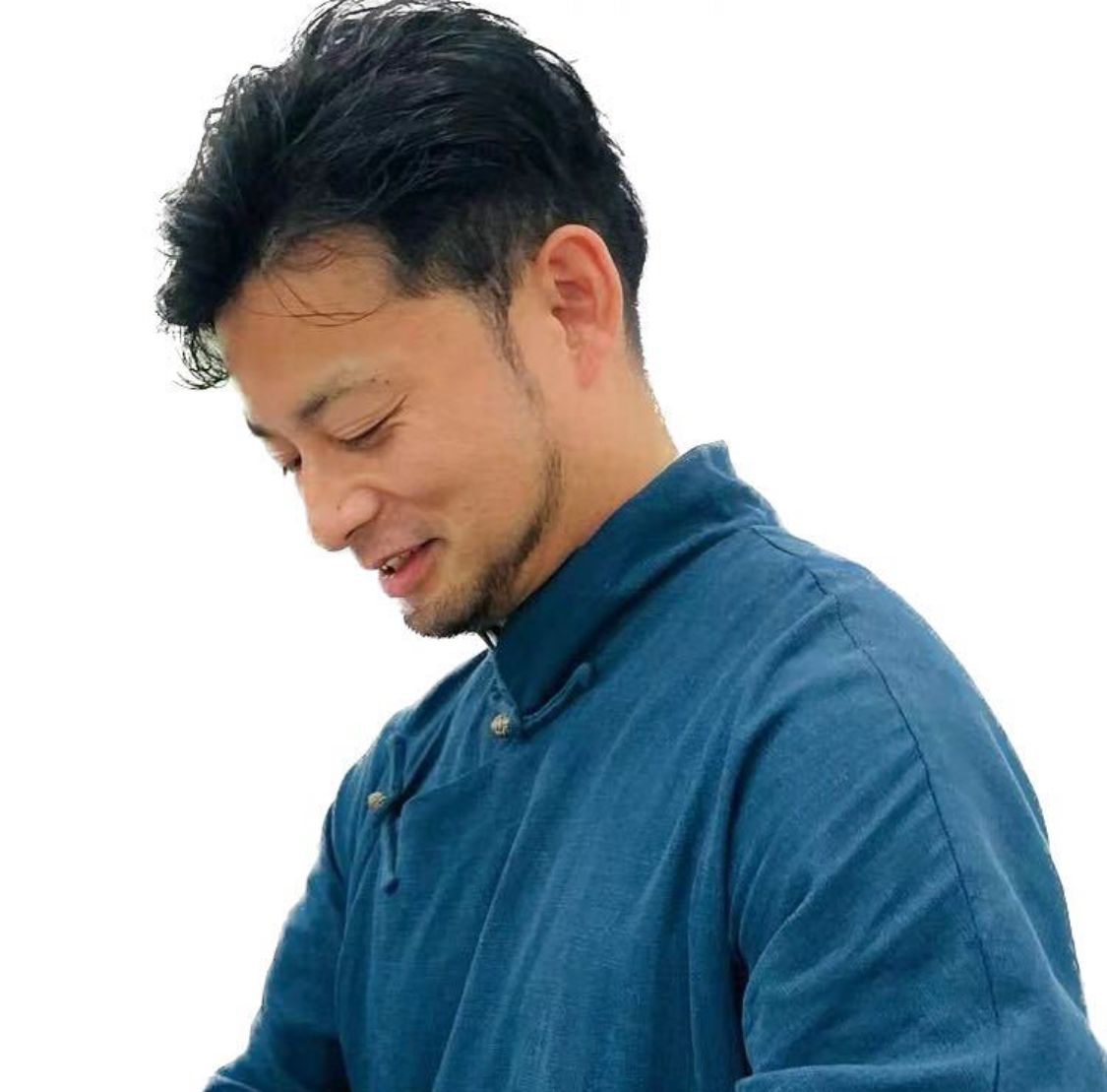 Hiroyuki Kobayashi working at a desk